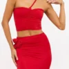 Tesia Slinky Jersey Rose Detail Asymmetric Top i scharlakansrött