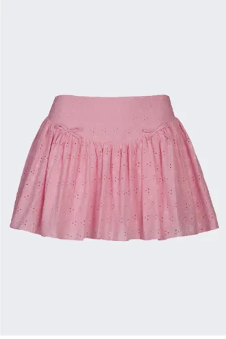 Thia minikjol med rosettdetaljer i broderie anglaise i mjukrosa