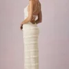 Tove maxiklänning med volanger, rygglös halterneck i ivory
