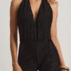 Tulay Devoré jumpsuit med halterneck och öppen rygg i svart