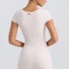 Unitard med rund halsringning i tvättad krämfärg