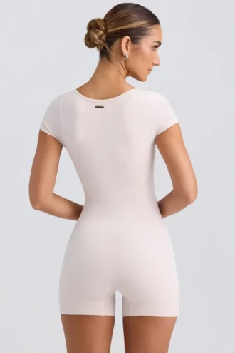 Unitard med rund halsringning i tvättad krämfärg