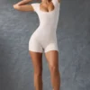 Unitard med rund halsringning i tvättad krämfärg