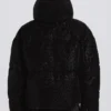 Vattentät, kort oversized skidjacka i svart leopardmönster