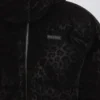 Vattentät, kort oversized skidjacka i svart leopardmönster