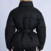 Vattentät oversized skidjacka med bälte i svart