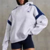 Överdimensionerad hoodie i bomullsfleece, melerad grå
