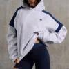 Överdimensionerad hoodie i bomullsfleece, melerad grå