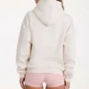 Överdimensionerad hoodie med applikation i elfenben