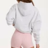 Överdimensionerad hoodie med applikation i gråmelerad