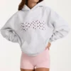 Överdimensionerad hoodie med applikation i gråmelerad