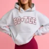 Överdimensionerad hoodie med applikation i grått