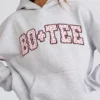 Överdimensionerad hoodie med applikation i grått