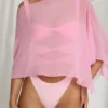 Zarayah genomskinlig poncho i Candyfloss Pink