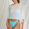 Zarayah genomskinlig poncho i vitt