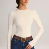 Ziva Modal rundhalsad långärmad Bodys i krämfärg